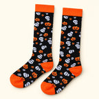 Calcetas Halloween negras con detalles naranjas · 1 par, vista en ángulo