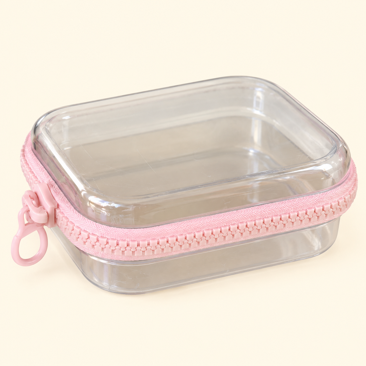 Estuche rígido transparente con cierre · rosa o azul