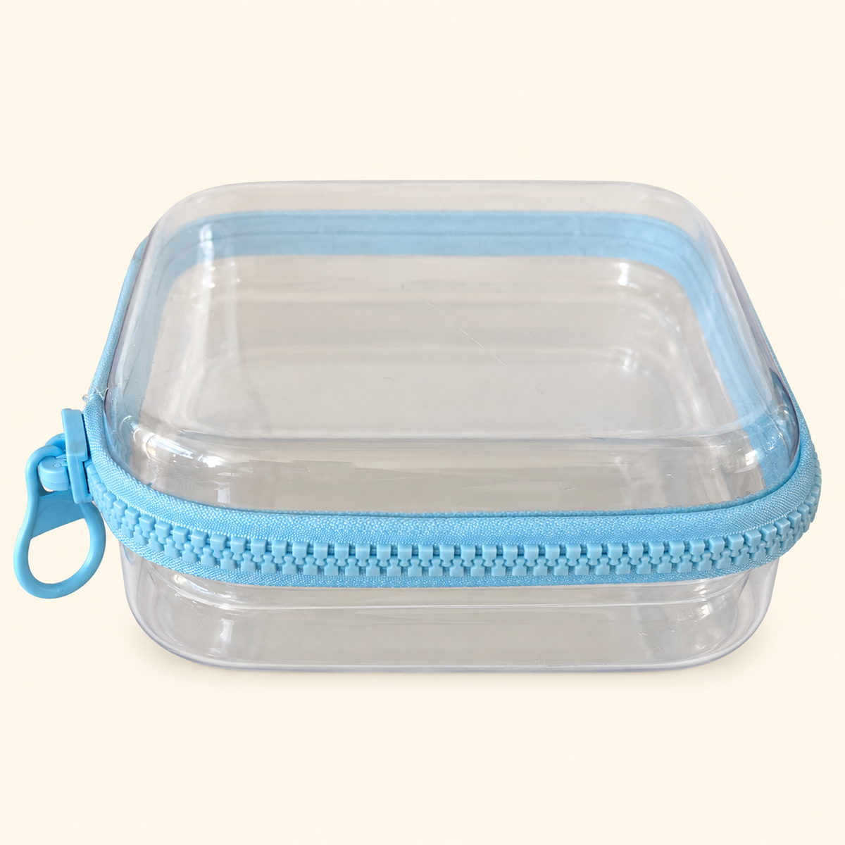 Estuche rígido transparente con cierre · rosa o azul