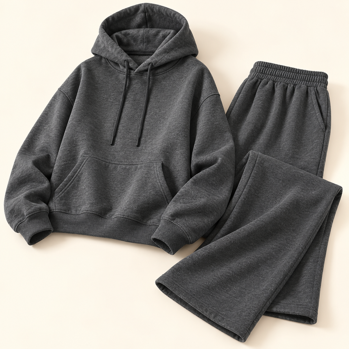 Conjunto de sudadera con capucha y pantalón · gris oscuro · detalle y piezas incluidas