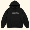 Sudadera negra con capucha y estampado ESSENTIALS Negro, talla M. Vista frontal.