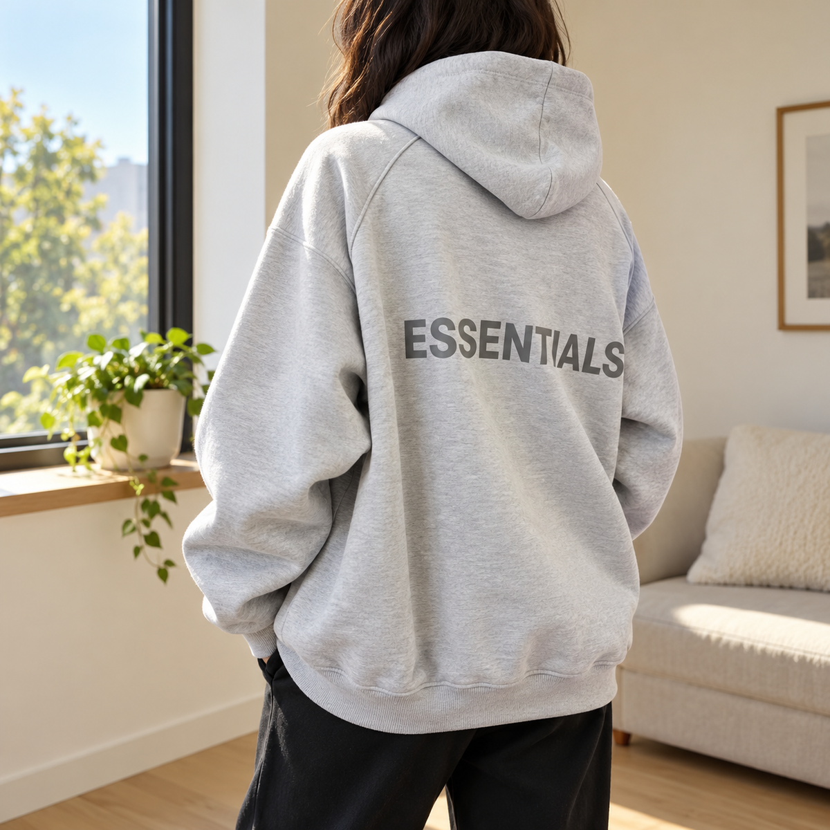 Sudadera gris oversize en uso, imagen ilustrativa reconstruida