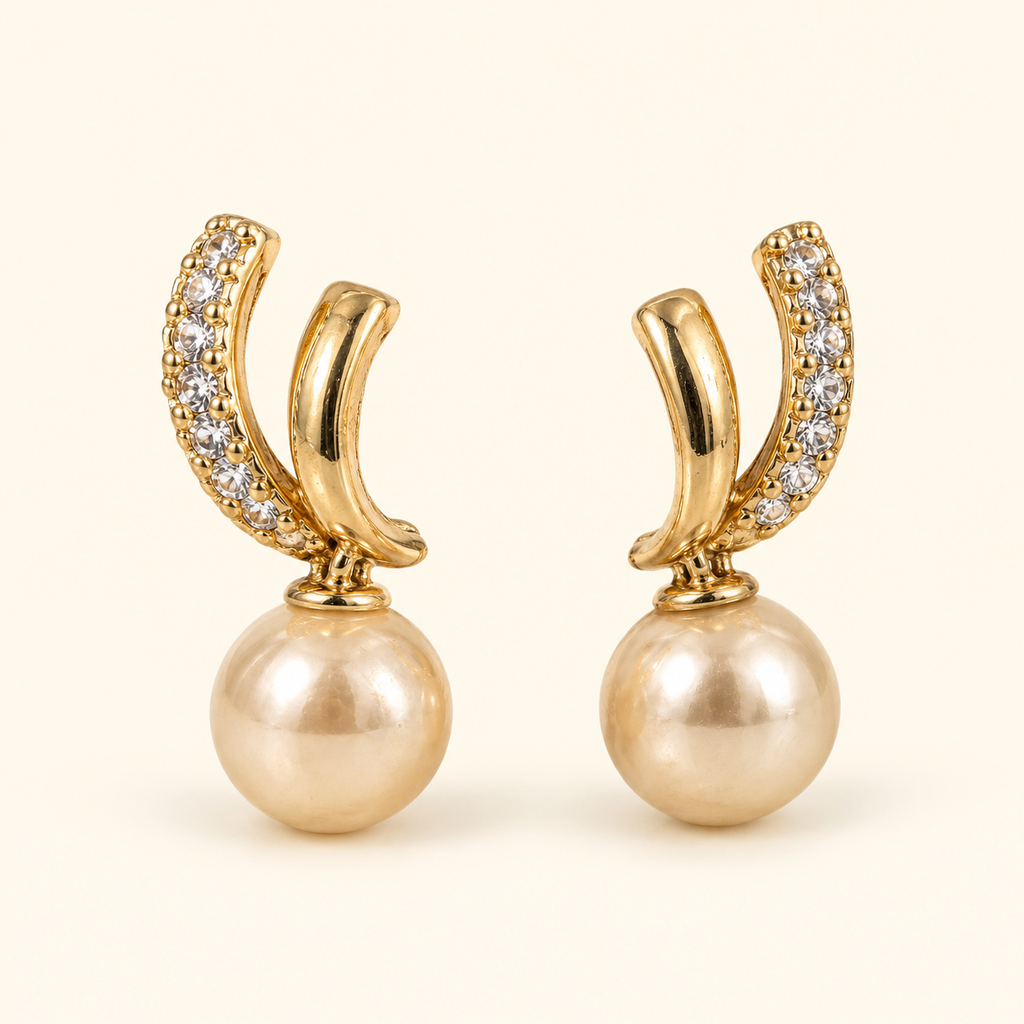 Aretes de doble curva y cuenta tipo perla