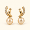 Aretes de doble curva y cuenta tipo perla