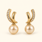 Aretes de doble curva y cuenta tipo perla
