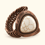 Brazalete cobrizo, centro blanco veteado, vista de estudio en ángulo
