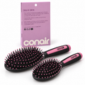 Set de 2 cepillos Conair Grip & Glide negro y rosa